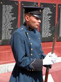 DSCN3168 guard at memorial wall.jpg